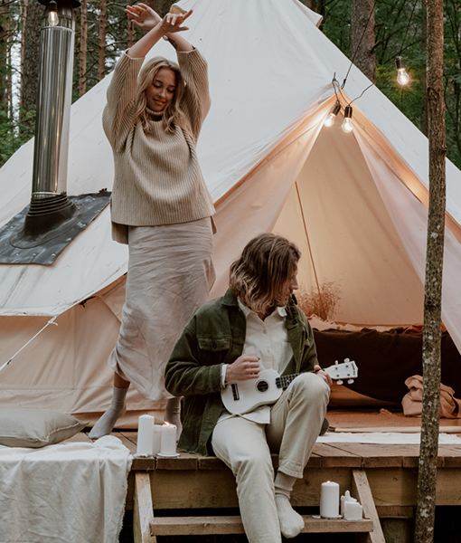Couple Camping Or Cabin